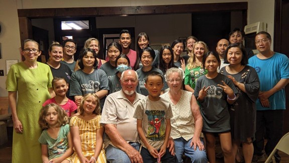 A group of volunteers taking a photo together